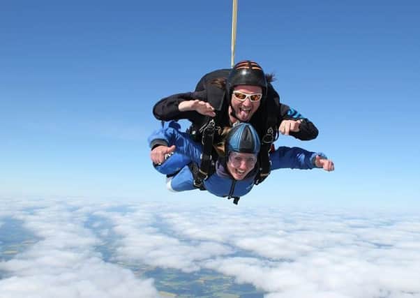 Littlehampton woman Michaela plunging through the clouds for charity
