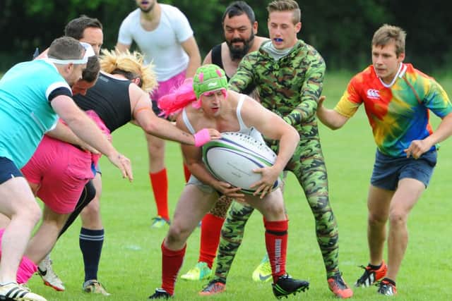JPCT 150613 Fat Boy Rugby Sevens tournament at Cranleigh Rugby Clubin aid of Help for Heroes. Barbies v Ray Warren. Photo by derek Martin