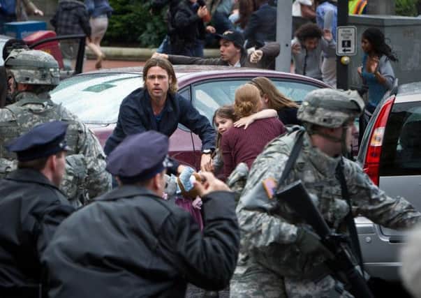 Undated Film Still Handout from World War Z. Pictured: Brad Pitt. See PA Feature FILM Pitt. Picture credit should read: PA Photo/Paramount Pictures UK.  WARNING: This picture must only be used to accompany PA Feature FILM Pitt.