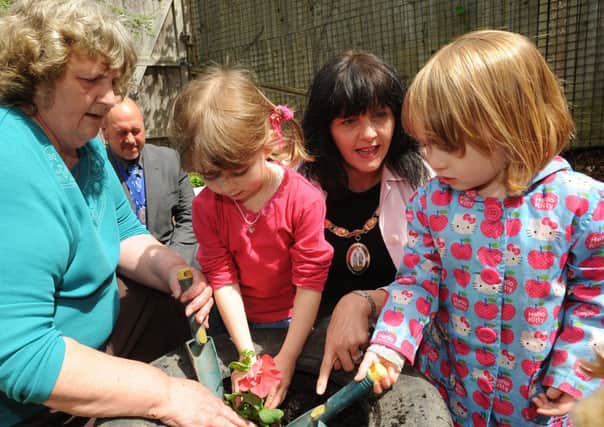 Garden is opened at Albermarle Little Builders by Haywards Heath Mayor Sandy Ellis