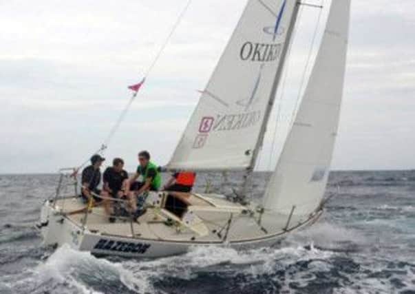 Liam Cattermole and fellow crew members involved in B3 sailing action