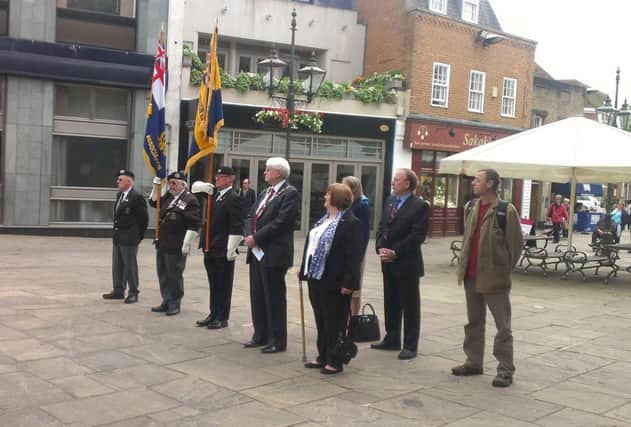 Armed Forces Day flag raising ceremony in the Carfax at the War Memorial in Horsham.