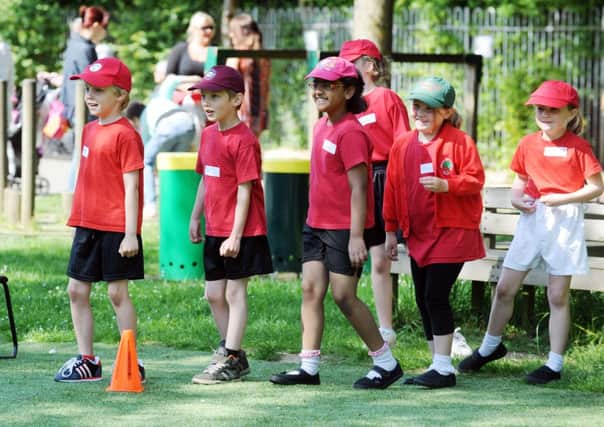 Children from years 2 and 3 are all smiles on sports day