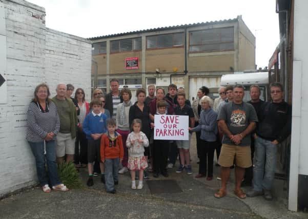 Concerned residents stand opposed to plans to convert an ex-workshop in Southcourt Road into a gym