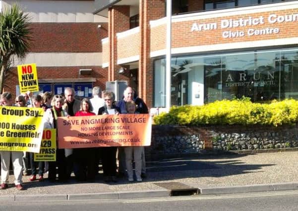 Save Angmering Village supporters demonstrate outside Arun Civic Centre
