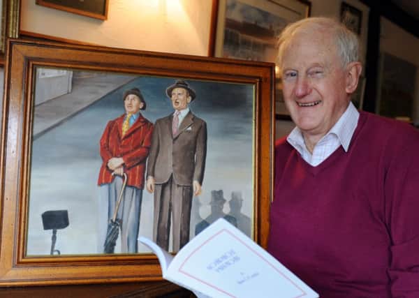 Brian O'Gorman who has written a book about his childhood and father a comedian, pictured in the painting on the lef . Picture by Kate Shemilt.C130771-1
