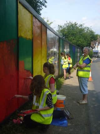 Rydon students painting their mural at Manley's Hill in Storrington