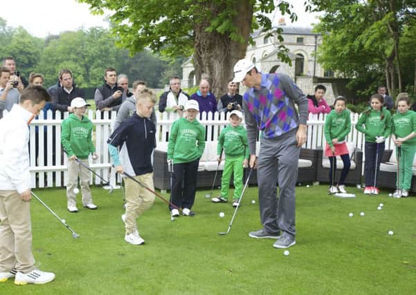 Justin Rose passes on his golfing expertise to juniors at Goodwood