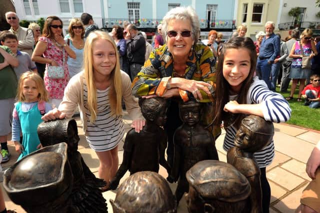 Sylvia Thornhill (centre) made the 'Children of the Fair' - a sculpture of seven children to commemorate the 700th St Lawrence fair this year. Joined at the unveiling by Ellie Finch and Poppy Haward