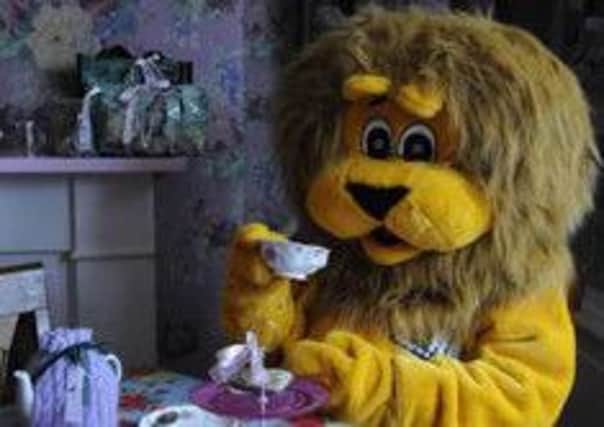 Lionel enjoys some tea at Pretty Thinngs
