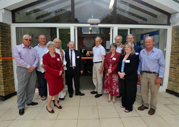 27/6/13- Opening of the new Hurst Green shop and cafe.  Members of the board, the Chair of the Parish, builders, shopfitters and Thomas Packenham at the ribbon cutting ceremony.