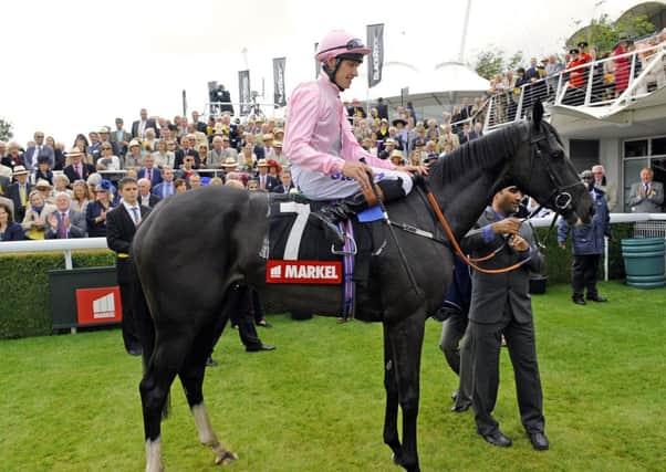The Fugue, ridden by Richard Hughes, in the winner's enclosure after the 2012 Nassau Picture by Malcolm Wells