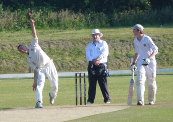 Jed O'Brien bowls for Hastings Priory seconds in their draw at home to East Grinstead on Saturday. Picture by Simon Newstead