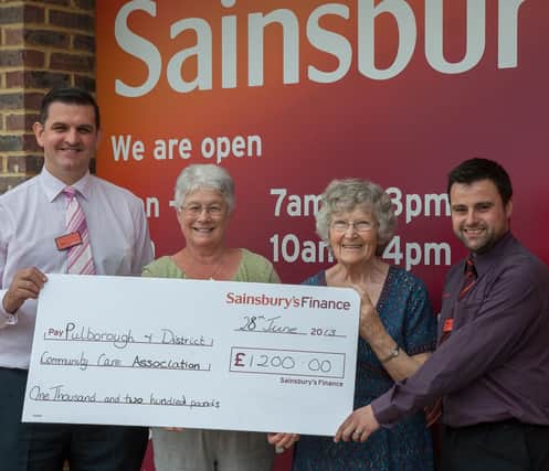 Manager of Sainsburys, Pulborough Jason Howell and Fresh Foods Manager Martin Sheppard presented a cheque for £1,200 to Pulborough and District Community Care Association last week.