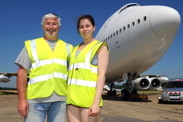 JPCT 080713  Rejuvenation of BoJPCT 080713  Rejuvenation of Boeing 747 at Dunsfold Park. Philip Paradise and daughter Maria. Photo by Derek Martin.