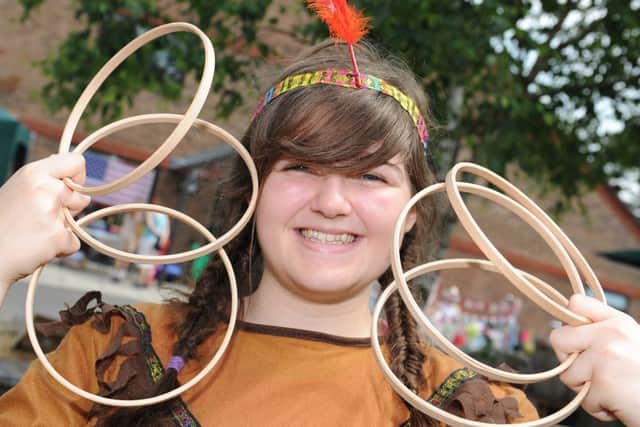 JPCT 060713 S13280735x Wild West themed fete. Lodge Hill Centre, Watersfield. Eleanor Pearce on the Hoop-La stall -photo by Steve Cobb