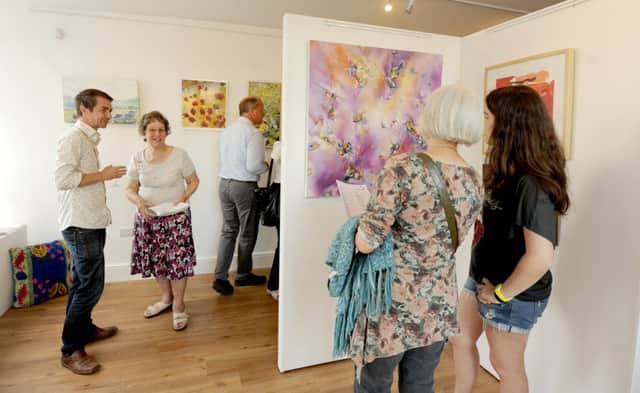 Preview night at Bognor Regis new art and craft gallery "Cloudhopper"

Picture by Louise Adams  C130923-1 Bog Jul11 Cloudhopper