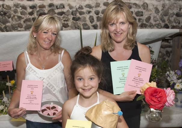 Sandy Cundy took second prize for her sweets, India Craddock's Dalek won her a first prize and Adrienne Craddock's flowers claimed a second prize