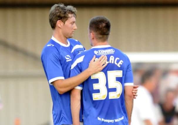 Ryan Bird, left, celebrates with Jed Wallace at Westleigh Park