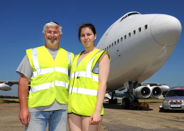 JPCT 080713  Rejuvenation of BoJPCT 080713  Rejuvenation of Boeing 747 at Dunsfold Park. Philip Paradise and daughter Maria. Photo by Derek Martin.