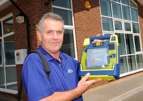 An instructor with the new defibrilator at the Angmering Community Centre