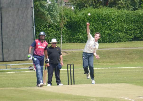 Bexhill v Norway cricket action - Jamie Wicks bowling for Bexhill