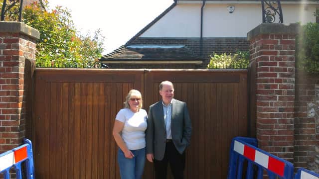 Mr and Mrs Sherwood outside their home