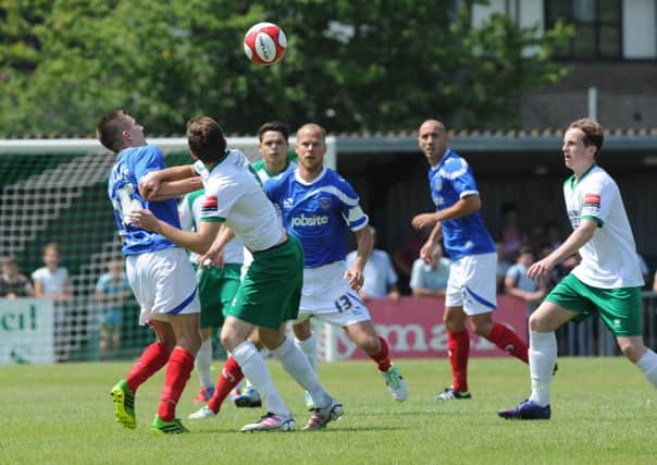 Action from a sun-baked Nyewood Lane as the Rocks and Pompey do battle  Picture by Paul Jacobs