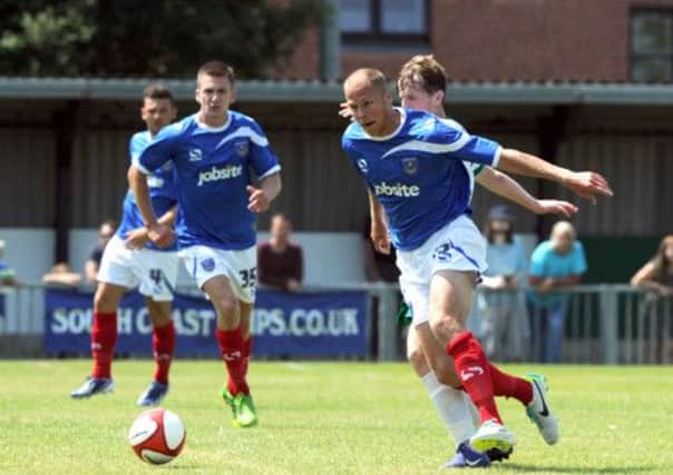 Johnny Ertl, right, in action for Pompey at Bognor as Jed Wallace looks on  Picture: Paul Jacobs