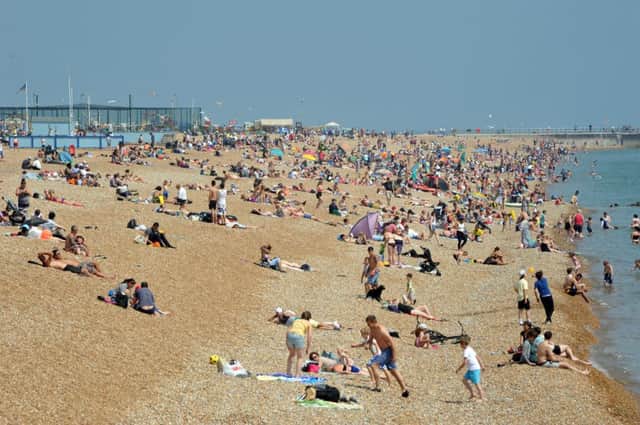 13/7/13- Crowded beach at Hastings.