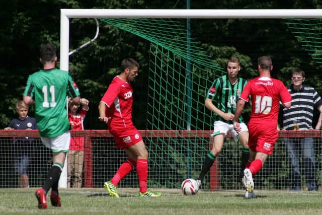 CrawleyTown's Jamie Proctor scores the opening goal after great work by teammate Sergio Torres. Burgess Hill Town v CrawleyTown, Leylands Park, Maple Drive, Burgess Hill, West Sussex RH15 8DL
Date 20-07-2013
Picture by Ken Sparks
Mobile 07968 045353 (Ken Sparks Photography) - 7 Leslie Park Road, East Croydon, Surrey CR0 6TN - Tel: 020 8655 2129 - Fax: 020 8655 2129