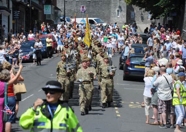 Soldiers from the Princess of Wales Royal Regiment parade through Arundel