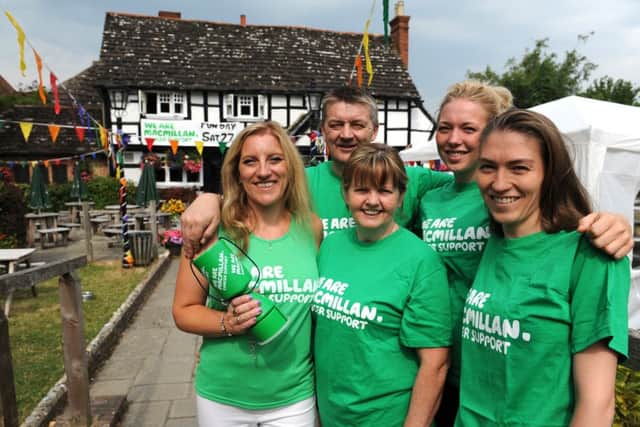 JPCT 230713 S13300312x Billingshurst. The Six Bells pub are holding their third annual charity event for Macmillan Cancer Support. Aimie caffyn, Richard and Bridget Hall, Kirsty and Vicky Cooper-Johnstone -photo by Steve Cobb