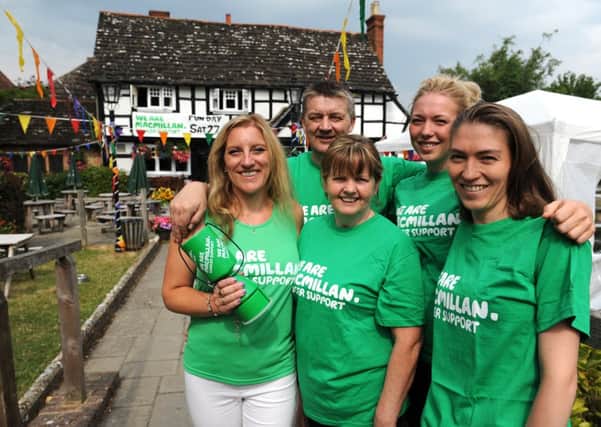 JPCT 230713 S13300312x Billingshurst. The Six Bells pub are holding their third annual charity event for Macmillan Cancer Support. Aimie caffyn, Richard and Bridget Hall, Kirsty and Vicky Cooper-Johnstone -photo by Steve Cobb