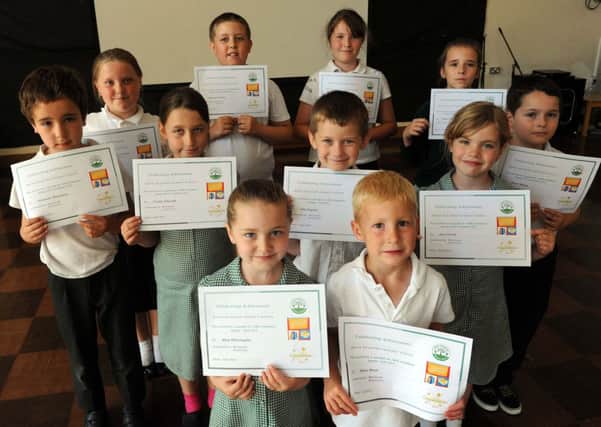 Some of the winners of the one year 100 per cent attendance challenge at White Meadows Primary School L31532H13