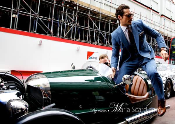 David Gandy leaps from his Morgan at London Men's fashion collection