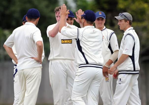 Hastings Priory celebrate taking a wicket during their win over Worthing last weekend. Picture by Liz Pearce