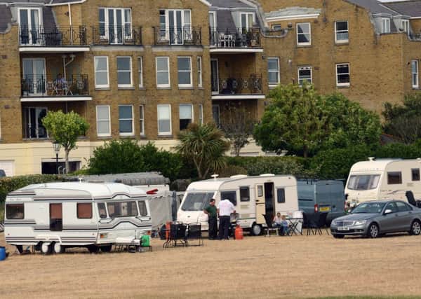 Travellers on could remain on The Green, in Littlehampton, until next week while Arun District Council begins legal action to regain possession of the land     L31590H13