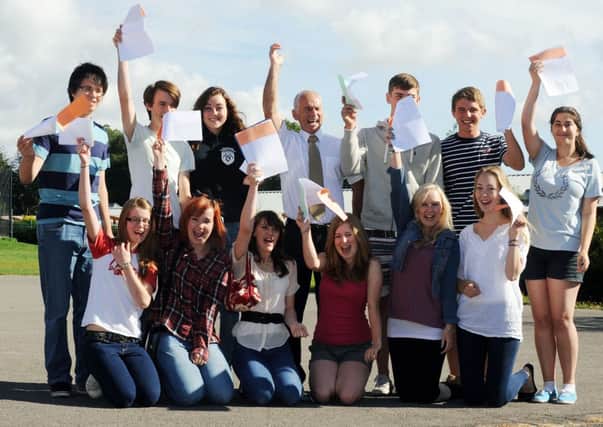S35040H12-GCSEsteyning - S35047H12-GCSEsteyning  230812   LP

Pupils get their GCSE results at Steyning Grammer. Pictured are high achievers with head master, Chris Taylor.