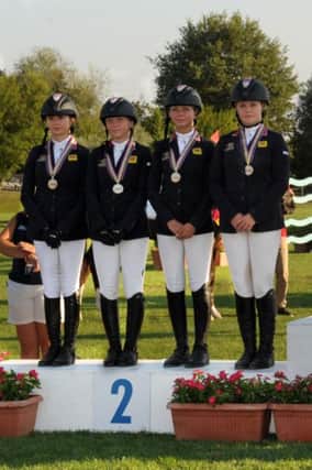 The Silver medal winning British Show jumping team from L to R - Amy Inglis, Millie Allen, Faye Adams and Emily Ward, European Pony Championships, Arezzo, Italy 26-7-13