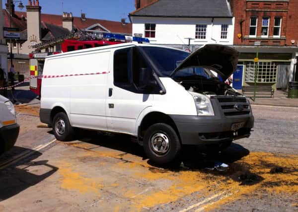 A van collided with a bollard in the Carfax