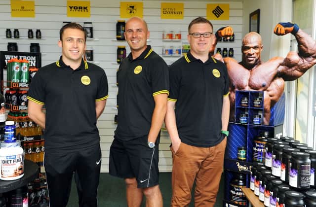 Left-right: Jamie Smith, Julian Barnes and Russell Knight of Supplement Locker in their new shop W31210H13