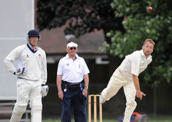 George Campbell, pictured here bowling in a recent match against Worthing, scored a half-century with the bat as Hastings Priory beat Chichester Priory Park