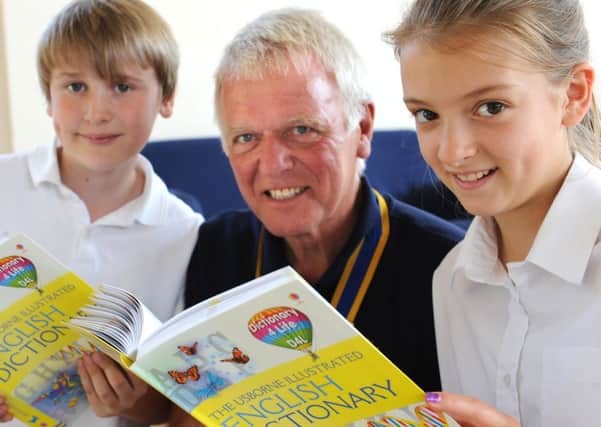 Tony Priestley, President Billingshurst and District Rotary Club with students from the school -photo by Steve Cobb
