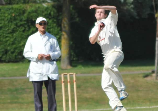 Jamie Wicks bowls for Bexhill against Ifield. Picture by Steve Hunnisett (eh32014a)