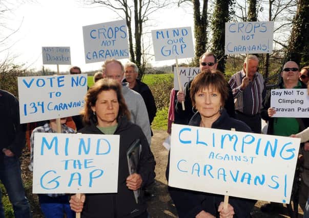 Campaigners protesting against the planned caravan site in Climping L14786h12