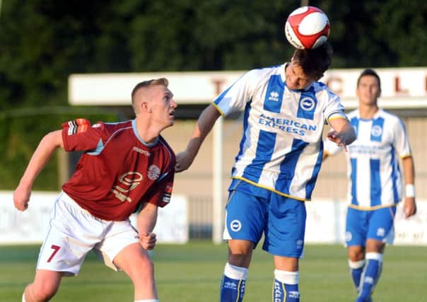 Matt Maclean challenges for possession during Hastings United's opening pre-season friendly against a Brighton & Hove Albion XI