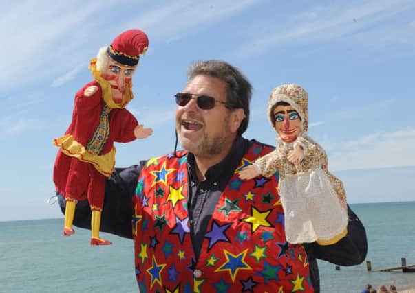 Pip Frederick performing with Punch & Judy as part of the 20 days of fun in the sun.   Picture by Louise Adams C131091-1