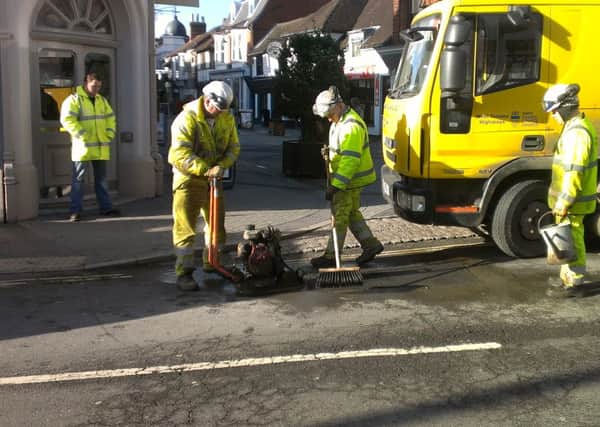 Pothole crew working in Horsham town centre.