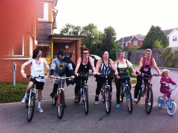 The Warmere Court cyclists (from left), Gordon Brown, Ken Teasdale, Claire Crow, Amber Porter, Rosie Kennedy, Charlene Bickle and mascot Madison Porter